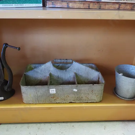 bench top mincer, segmented metal basket, tin garden planter