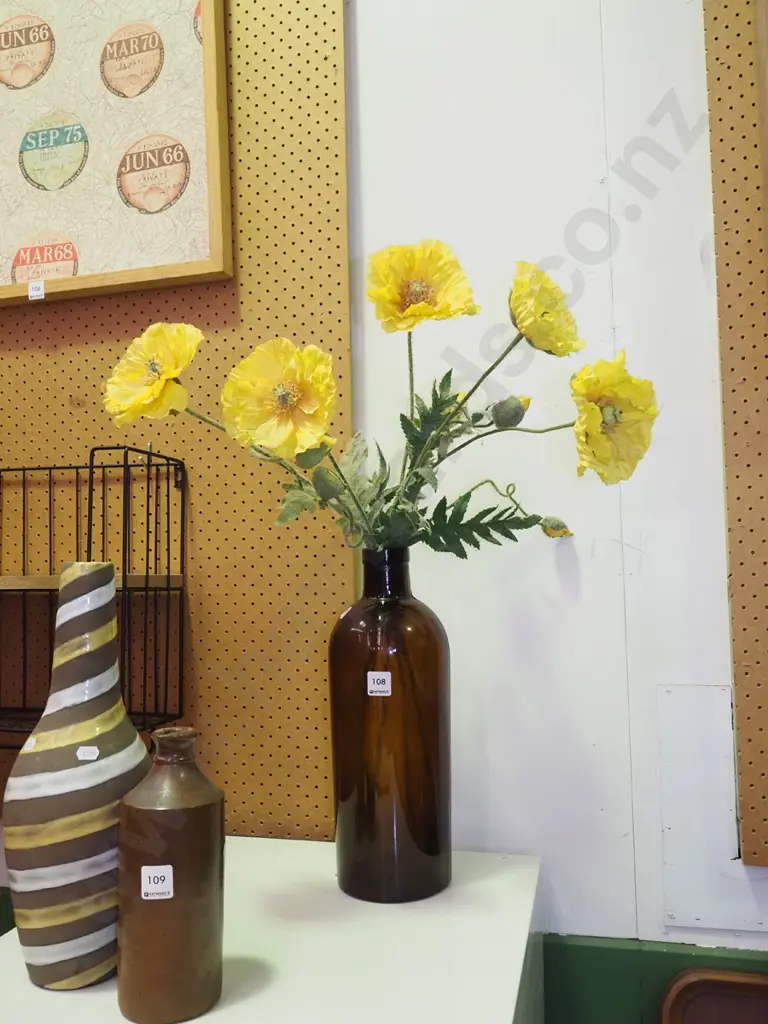 large amber bottle and faux flowers H370 Image 1++