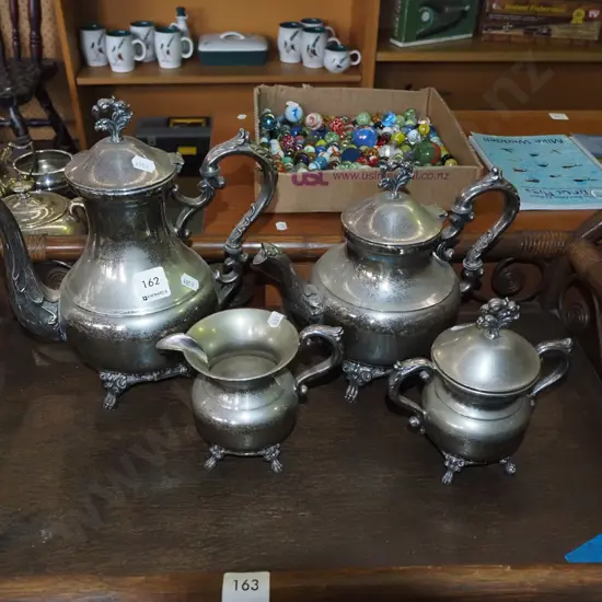 teapots, creamer, lidded sugar