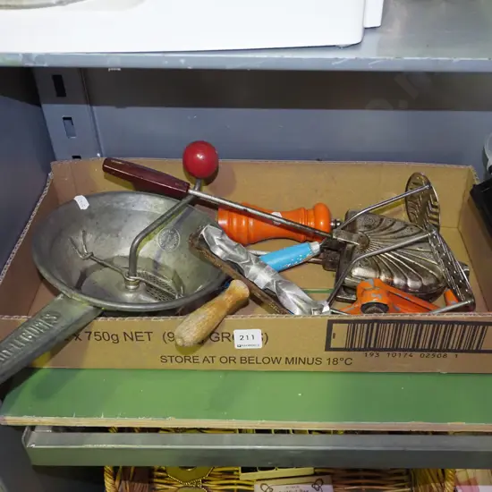 box of kitchen utensils