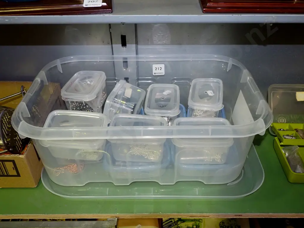 plastic tubs of jewellers chains Image 1++