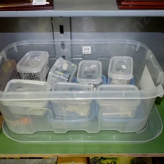 plastic tubs of jewellers chains