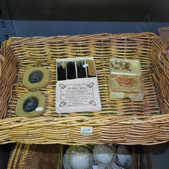 cane basket; hair pins, eye glass mounts, floral prints