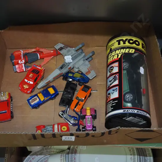 box; various toy vehicles