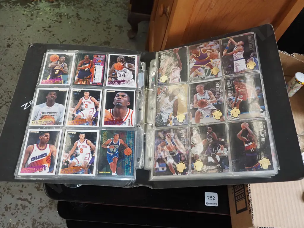 album of basketball collector cards Image 1++