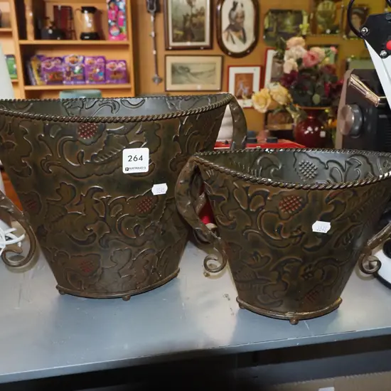 2x pressed metal vases H220