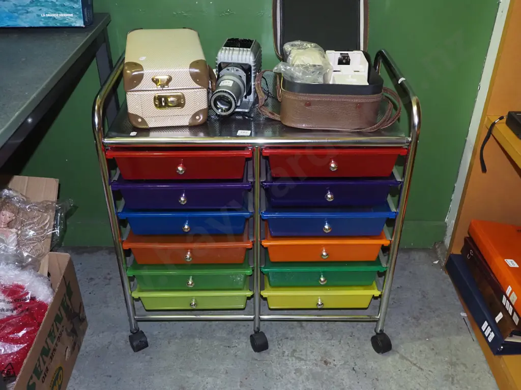 multi coloured plastic organiser trays in metal frame on casters Image 1++