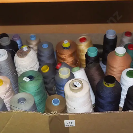 box of sewing machine threads