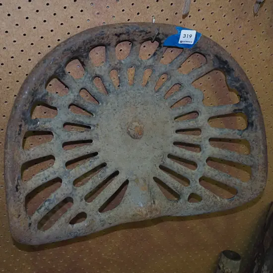 rusty vintage tractor seat