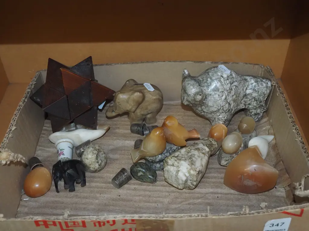 box; wooden puzzle, carved stone animal figurines, various thimbles Image 1++