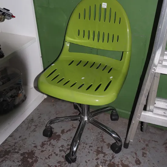 green plastic office chair