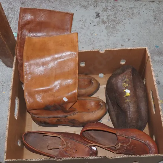 box; leather boots, shoes, old rugby ball