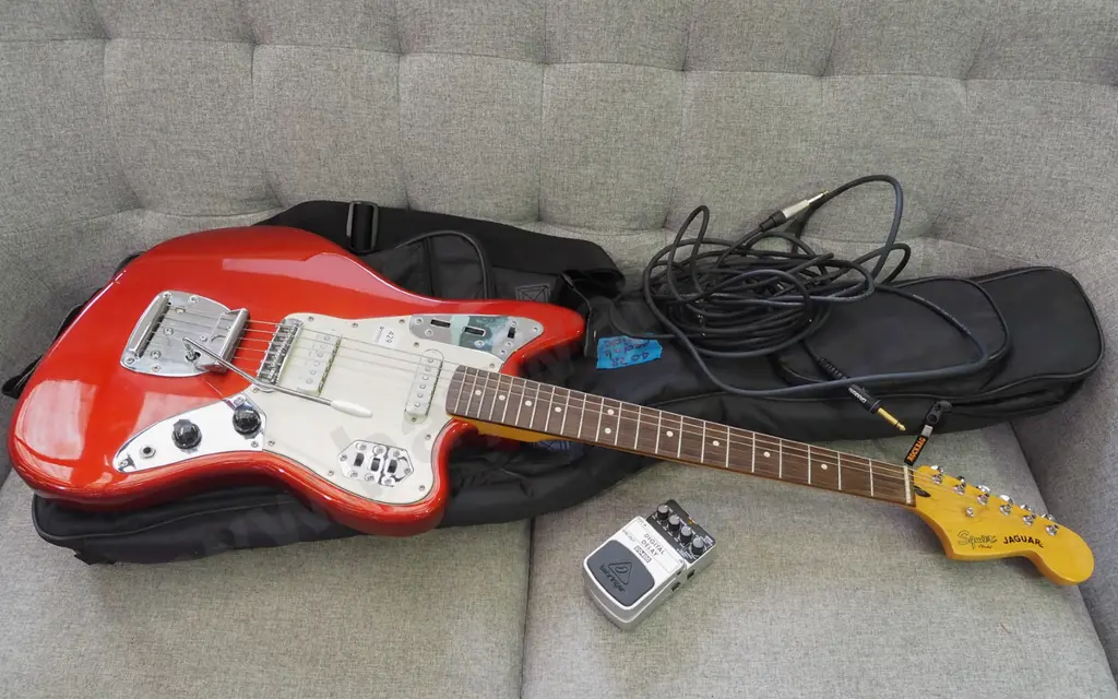 Fender Squire Jaguar electric guitar, includes leads, soft carry case, delay pedal, tuner. Image 1++