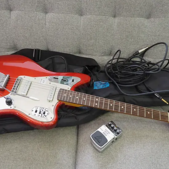 Fender Squire Jaguar electric guitar, includes leads, soft carry case, delay pedal, tuner.