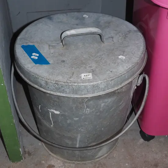 galvanised lidded ash can