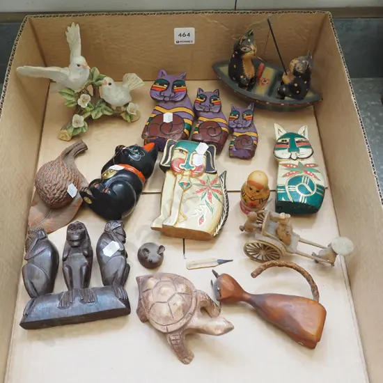 box of carved animal ornaments, ceramic doves