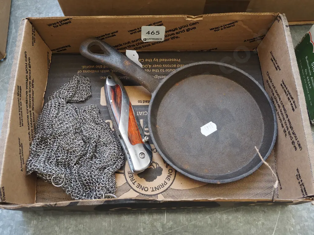 box; butchers glove, pocket knife, small cast iron frying pan Image 1++