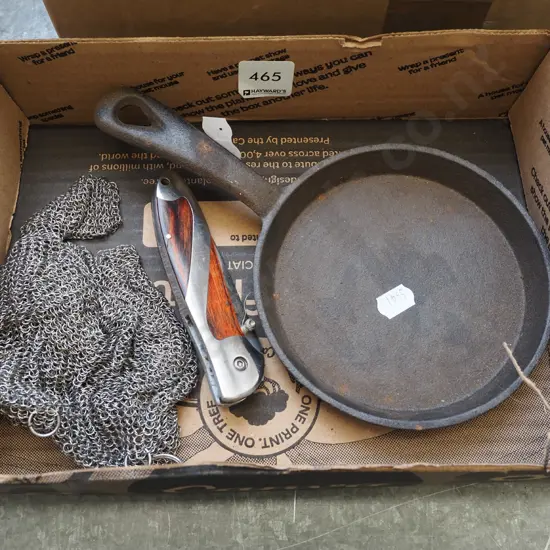 box; butchers glove, pocket knife, small cast iron frying pan
