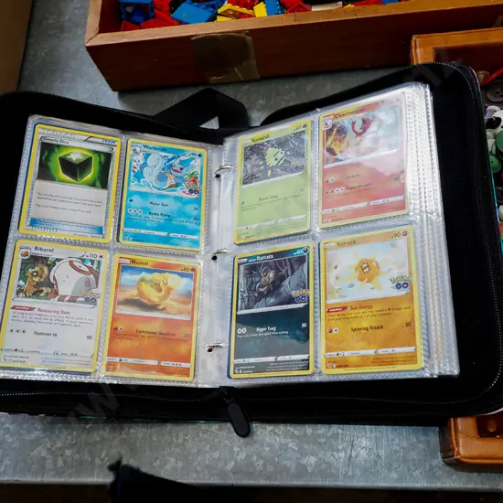 Pokemon cards and album