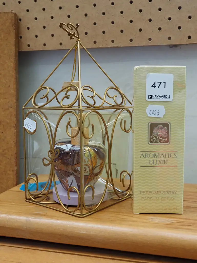 box; Aromatics Elixir perfume spray 45ml, Lolita Lempicka perfume in apple shaped bottle Image 1++