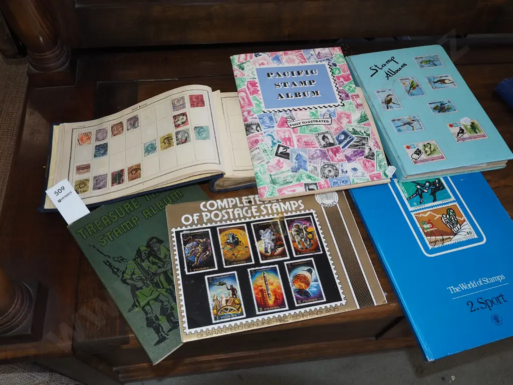 7x stamp albums Image 1++