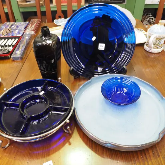 blue glass bowl, plates, gin bottle, studio pottery platter etc