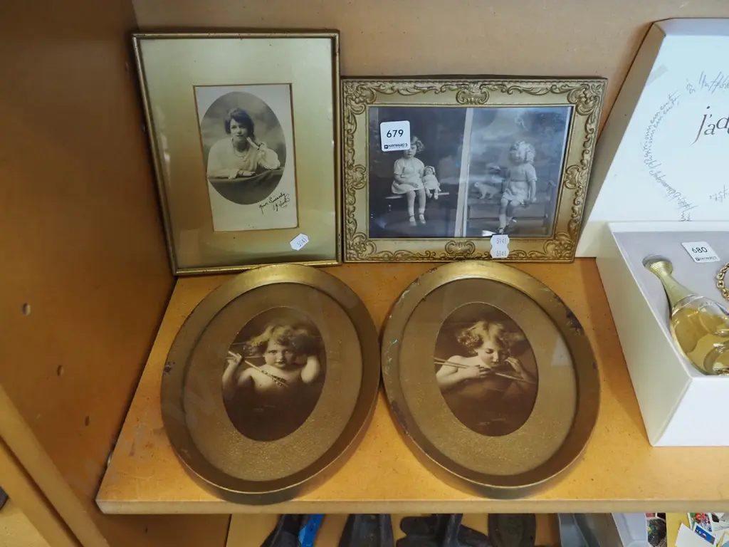 cherub prints, 2 framed photographs Image 1++