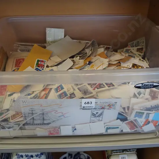 plastic tub of stamps