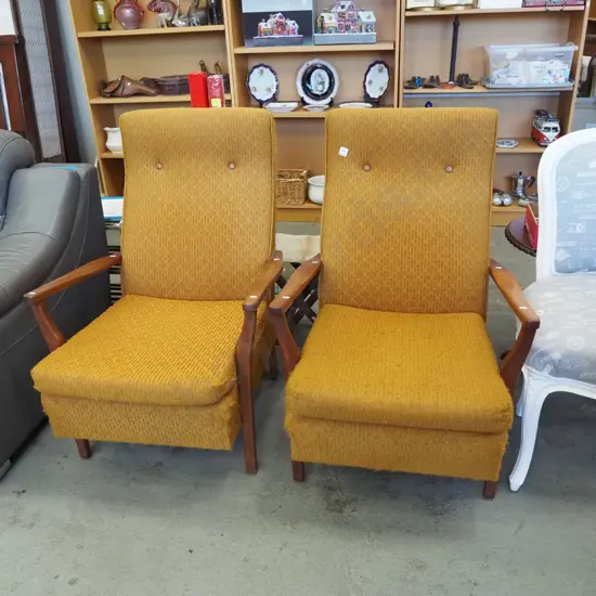 pair of mid century orange upholstered armchairs need attention