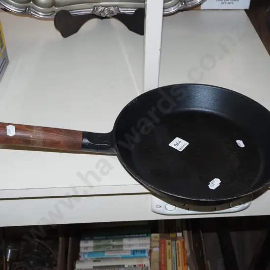 cast iron wooden handled frying pan