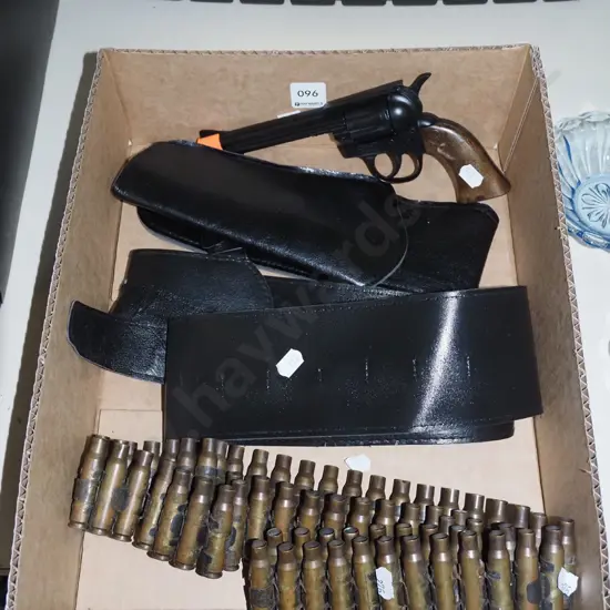 toy gun, holster, belt of shell casings