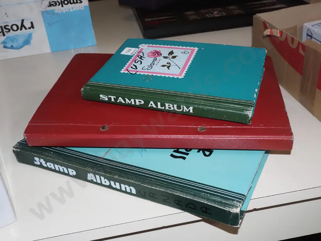 3x stamp albums Image 1++