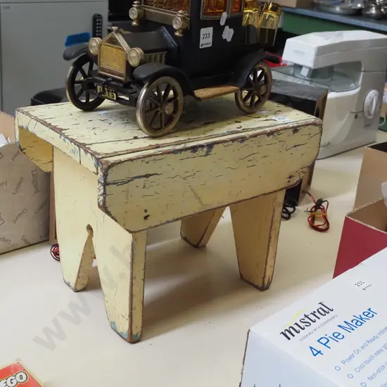 small painted wooden stool