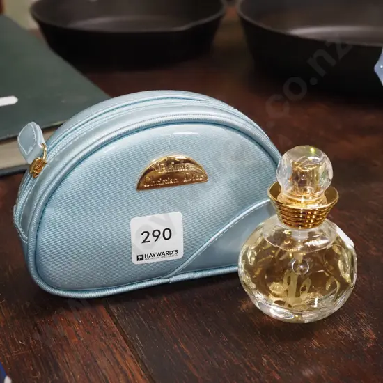 bottle of Christian Dior eau de toilette 30ml and makeup purse