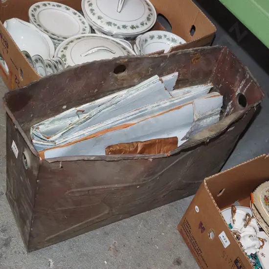 copper cistern with various pieces of copper