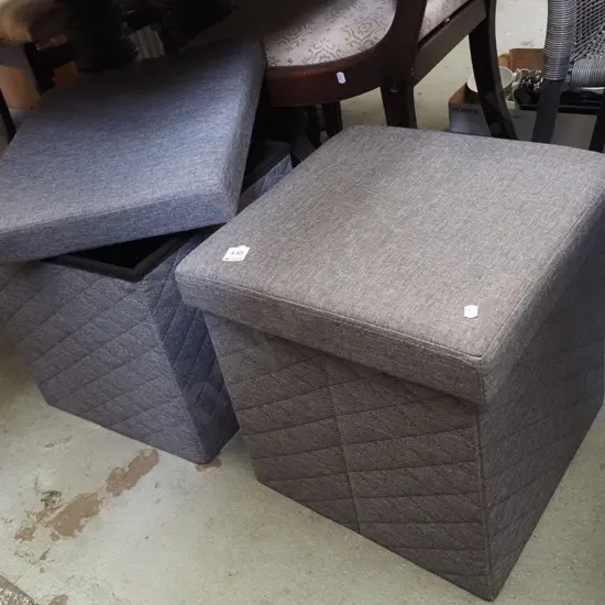2x grey storage ottomans