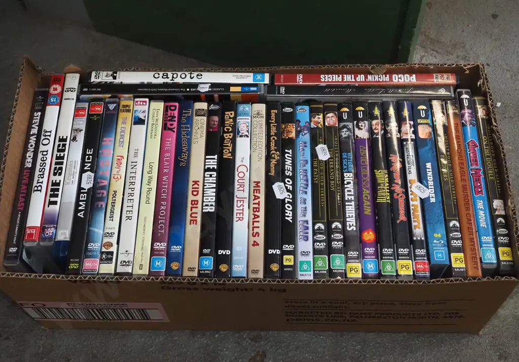 box of DVDs Image 1++