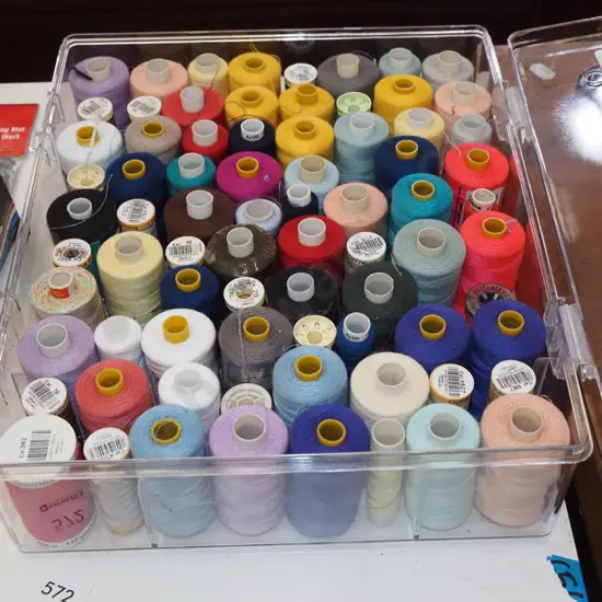 plastic container of threads