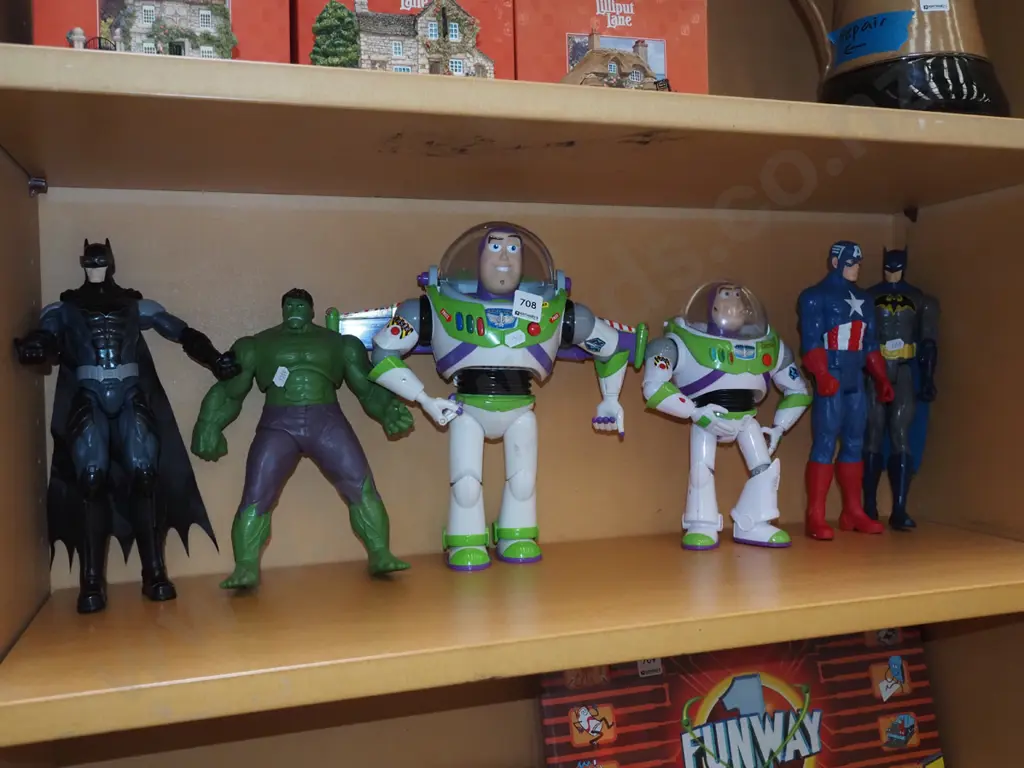 shelf of action figurines Image 1++