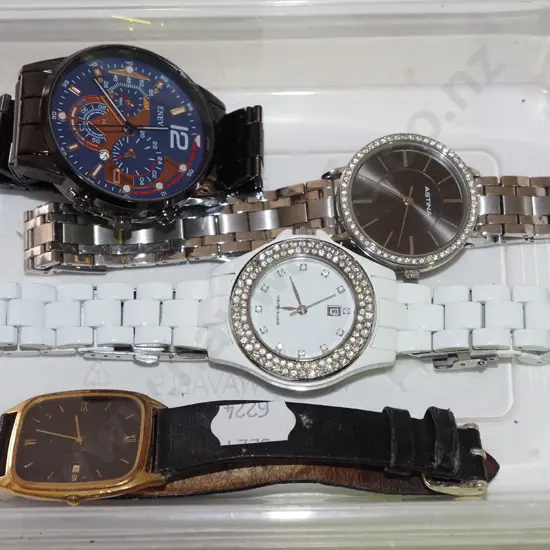 tray of 4 wristwatches