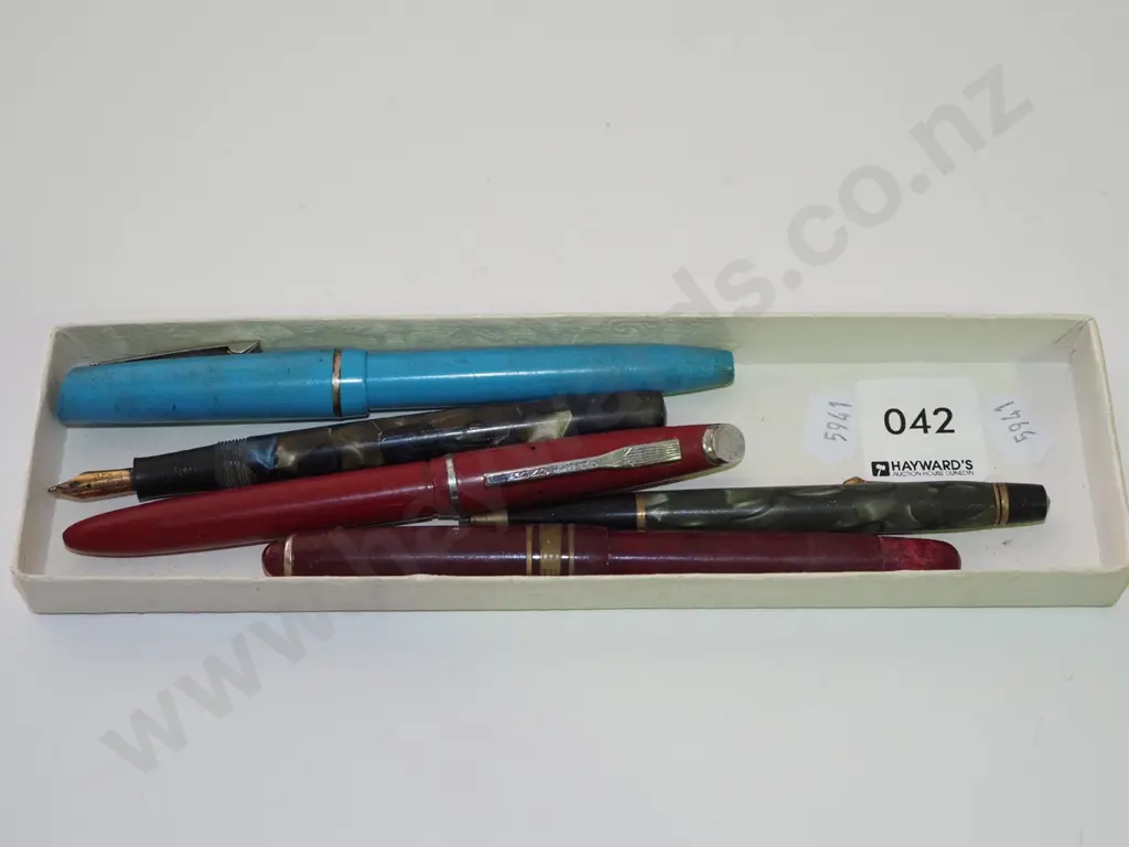 tray of pens Image 1++