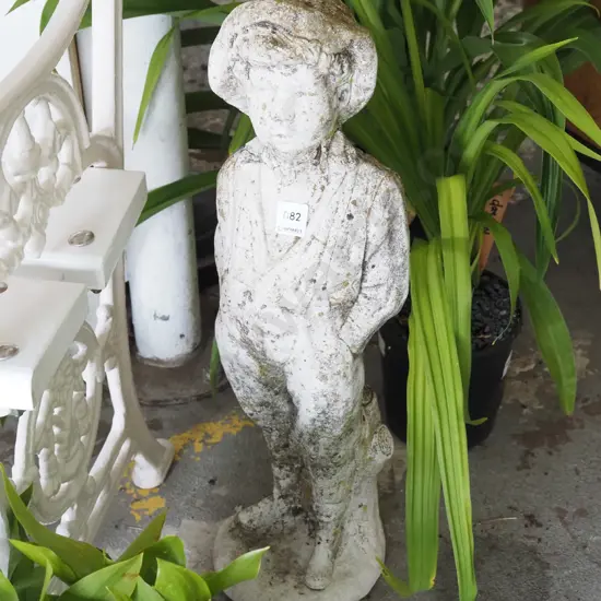 concrete figurine - whistling boy H570