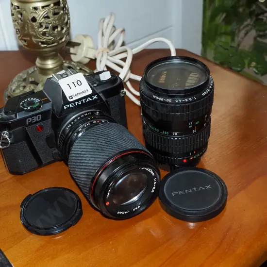 Pentax P30 35mm film camera with additional lens