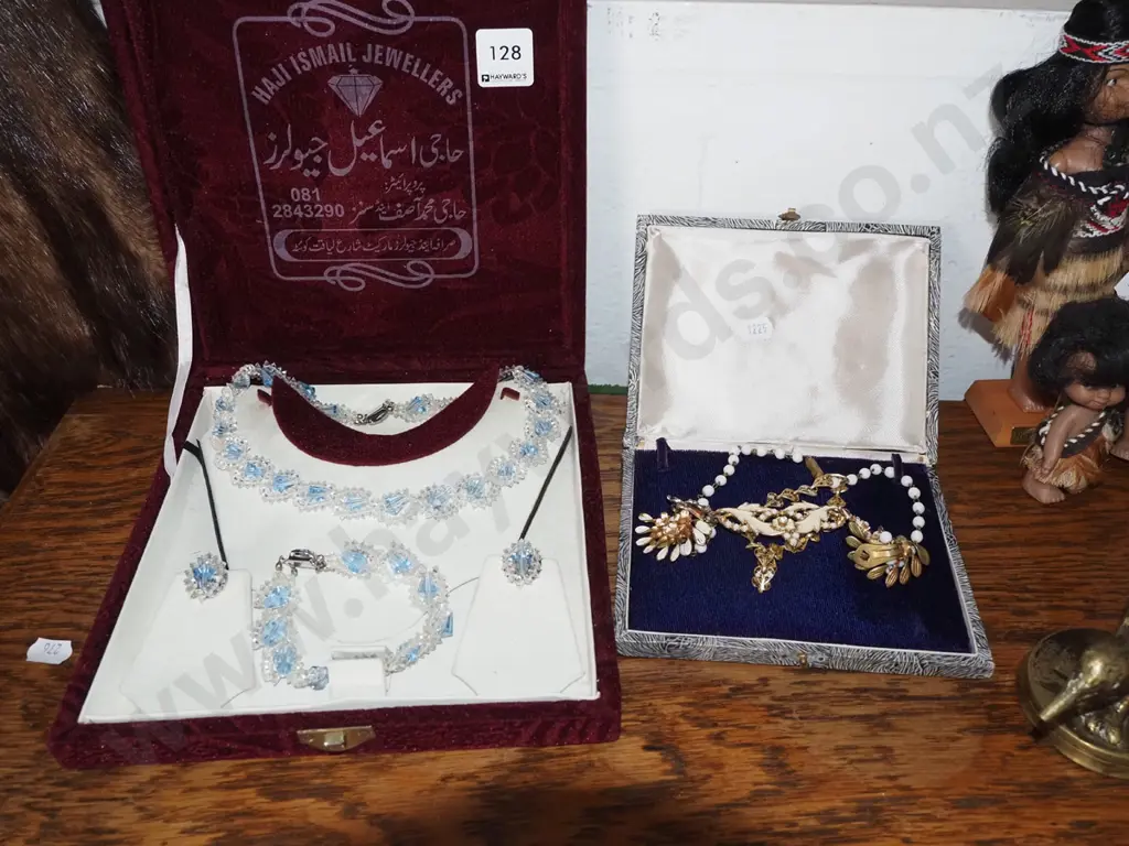 cased necklace and bracelet set, one other set Image 1++