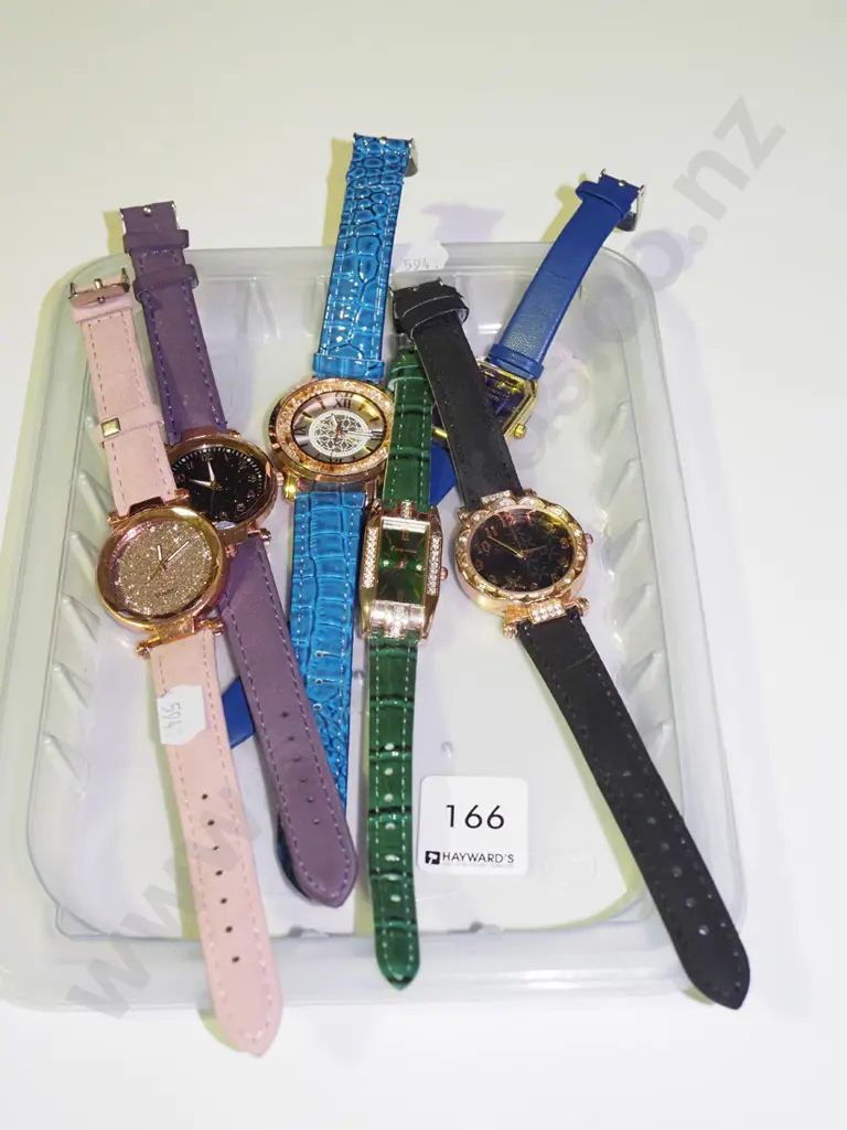 tray of wristwatches Image 1++