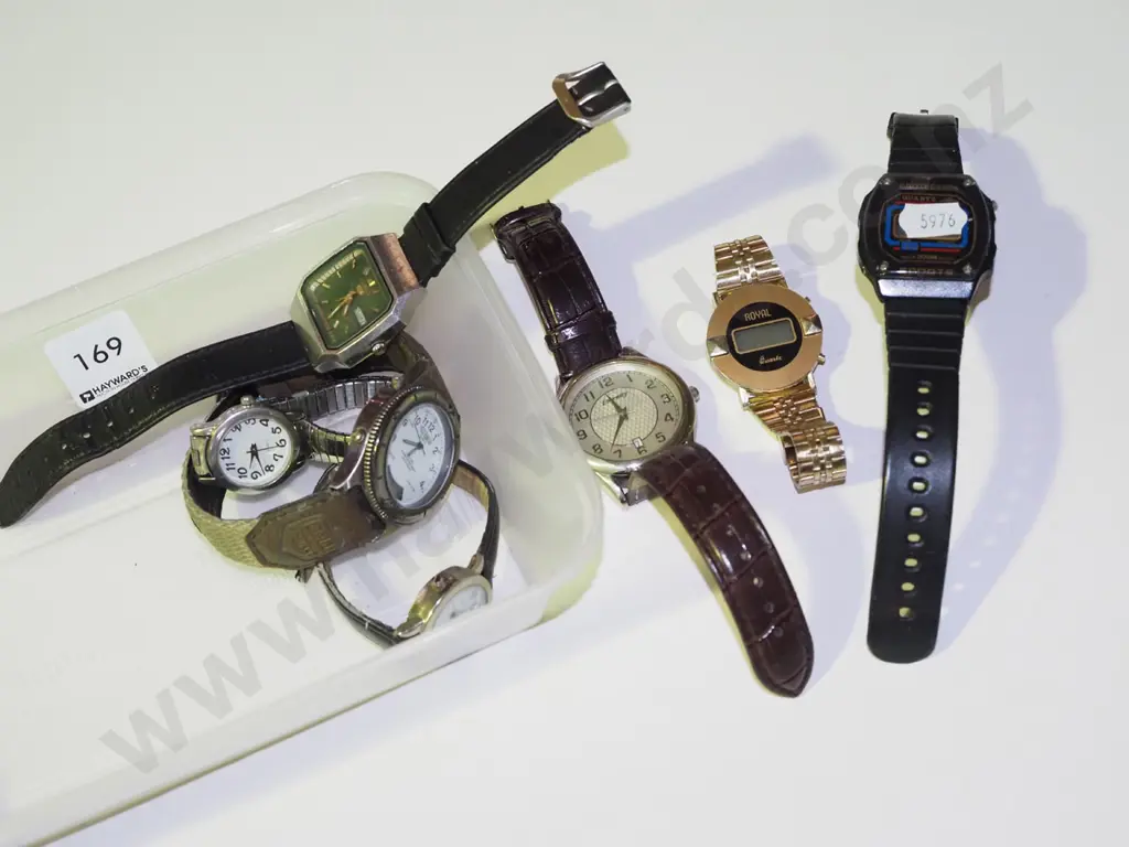 tray of wristwatches Image 1++