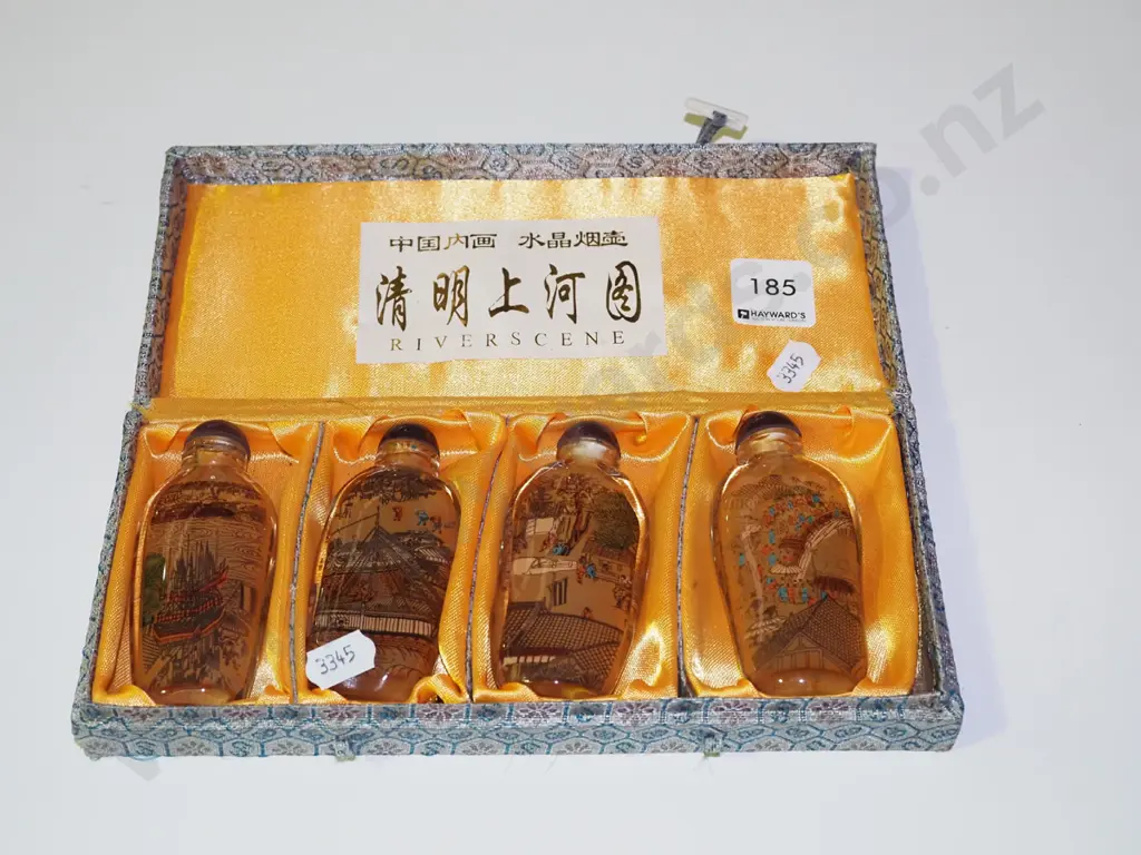 cased Asian scent bottles Image 1++