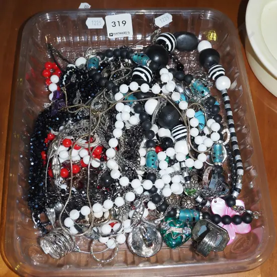 plastic tray of costume jewellery