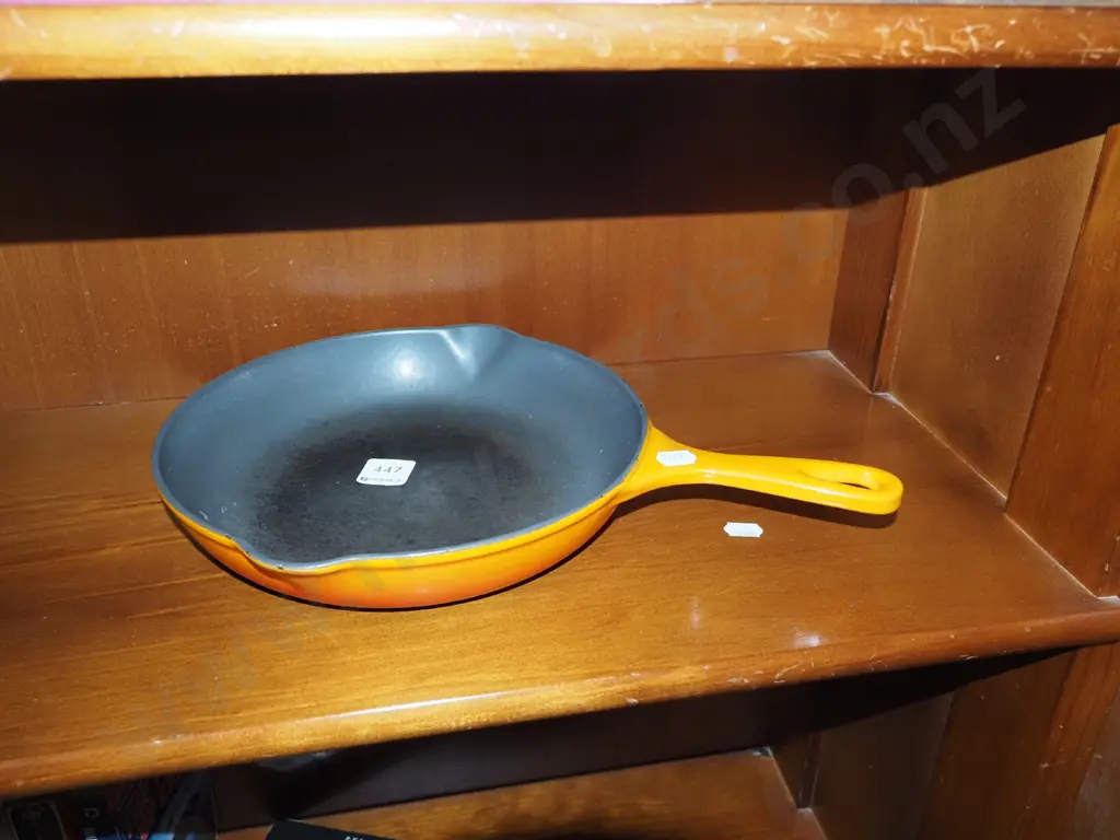 orange enamel and cast iron Le Creuset frying pan Image 1++