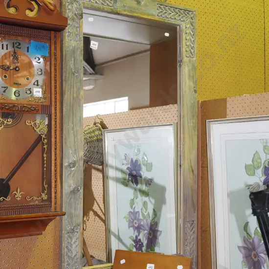 carved wood framed wall mirror